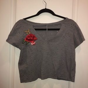 Distressed crop top with patch
